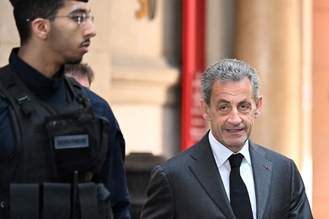 A French court had convicted former President Nicolas Sarkozy on charges of corruption and influence peddling, handing him a three-year prison sentence of which two years are suspended. (AFP)