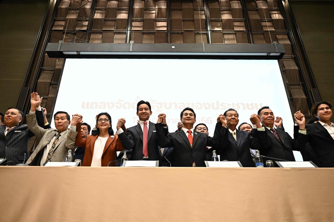 Above, Move Forward Party leader and prime ministerial candidate Pita Limjaroenrat, center, and other potential coalition partners during a meeting in Bangkok on May 18, 2023. (AFP)
