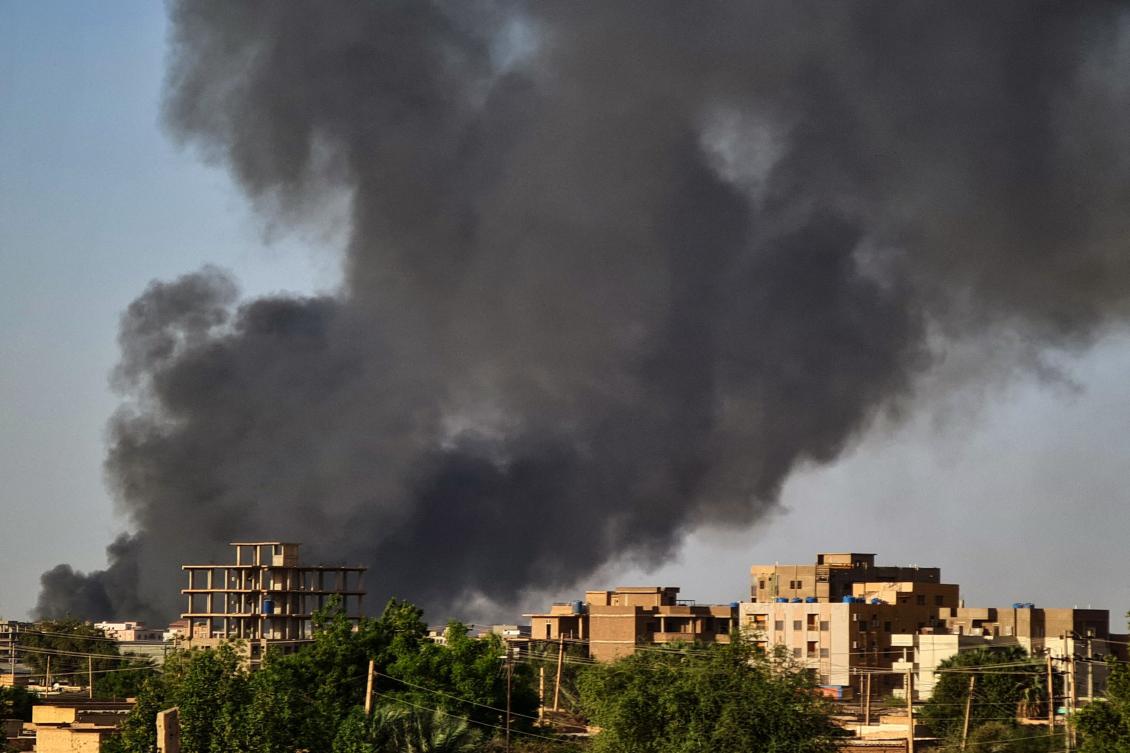 Smoke rises above buildings in Khartoum, as violence between two rival Sudanese generals continues. Khartoum was again rocked by battles, more than a month into a brutal war that has made "more than half" of the already impoverished country in need of aid, according to the United Nations.(AFP)