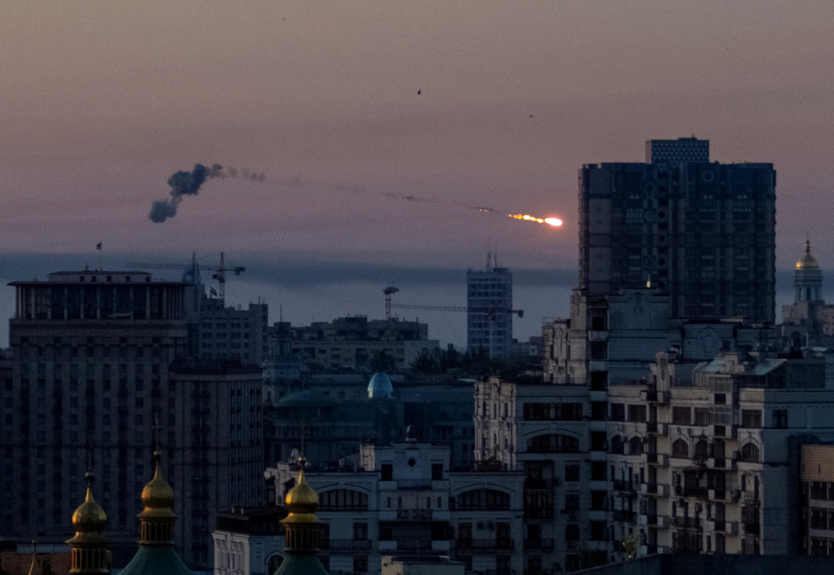An explosion is seen in the sky over Kyiv during a Russian missile strike on the Ukrainian capital on May 18, 2023. (REUTERS)