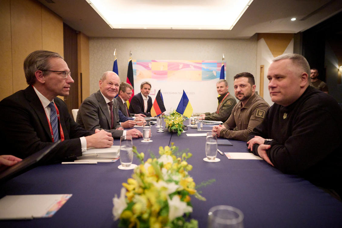 Ukraine’s President Volodymyr Zelensky and German Chancellor Olaf Scholz attend a meeting during the G7 leaders’ summit in Hiroshima on May 20, 2023. (Reuters)