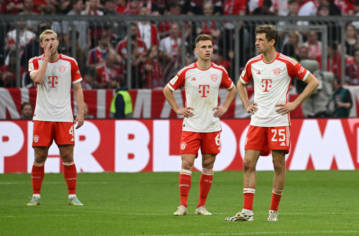 Bayern Munich’s Thomas Mueller, Joshua Kimmich and Matthijs de Ligt look dejected after conceding their third goal during their Bundesliga match against RB Leipzig at Allianz Arena on May 20, 2023. (Reuters)