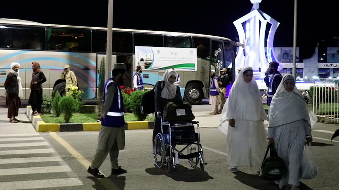 Afghan Hajj pilgrims gather at the Kabul airport to depart for Saudi Arabia. (AN Photo)