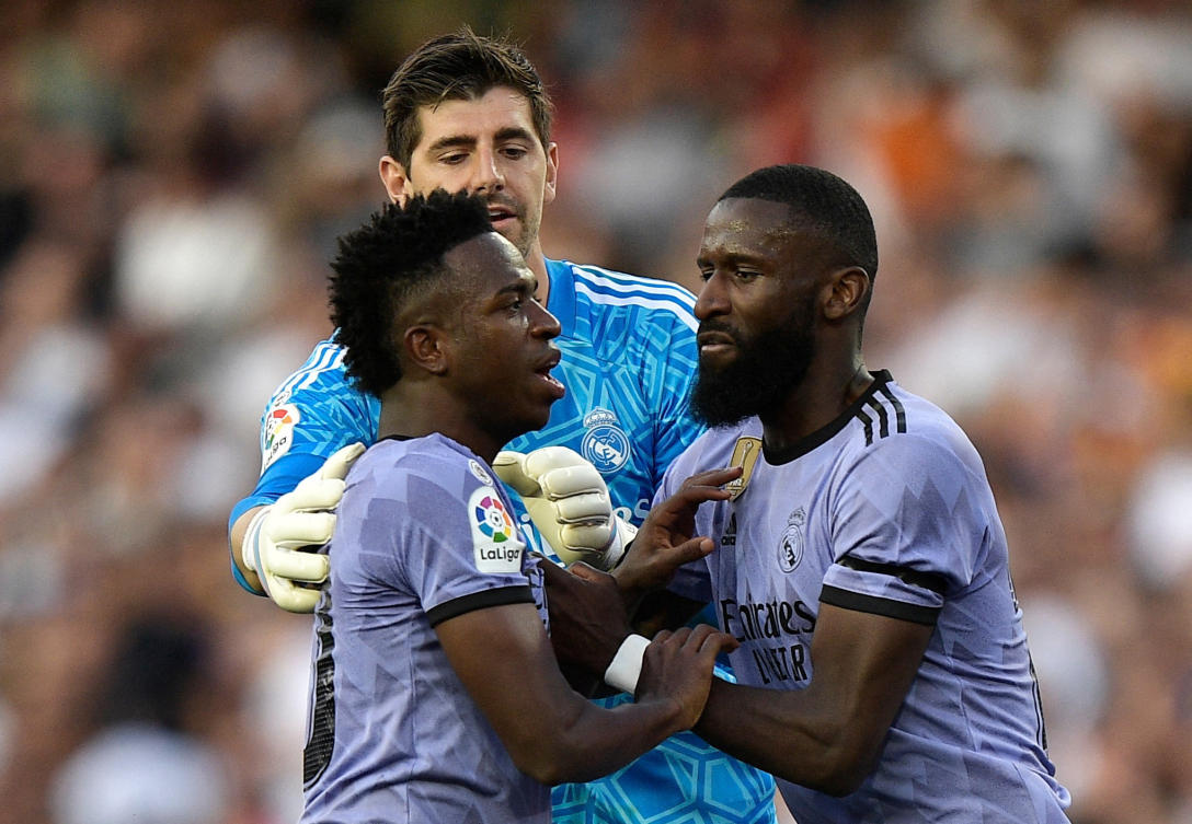 Real Madrid’s Vinicius Junior is restrained by Antonio Rudiger and Thibaut Courtois after being sent off during their LaLiga match against Valencia at Mestalla, Valencia on May 21, 2023. (Reuters)