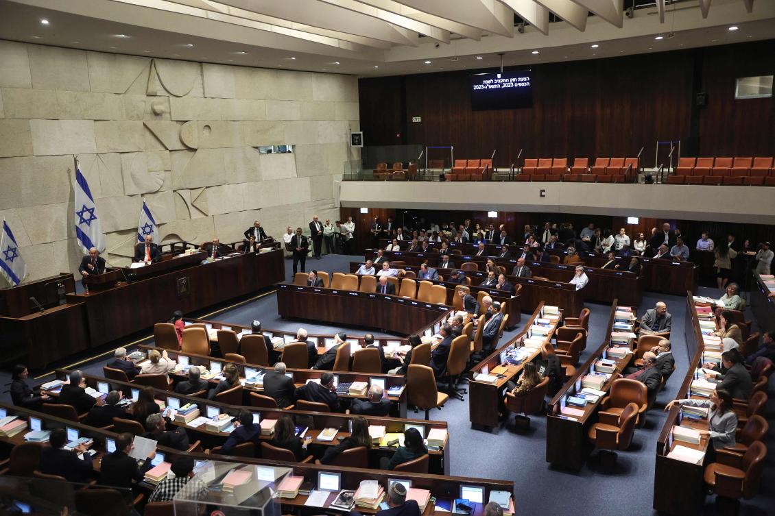 Israeli prime minister Benjamin Netanyahu, top left, delivers a speech at the Knesset during a session to vote the national budget on May 23, 2023. (AFP)