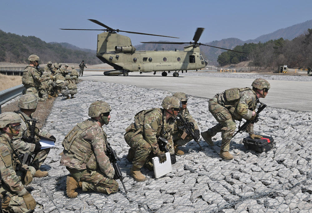 Above, US soldiers during a field artillery battalion gun raid drill in Pocheon, South Korea on March 19, 2023. The US-South Korean live-fire drills this week, called ‘the combined annihilation firepower drills,’ would be the biggest of their kind. (AFP)