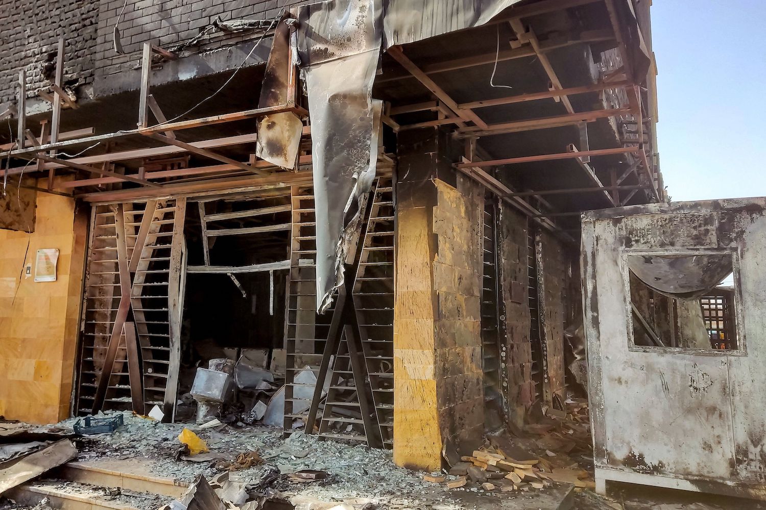A burnt-down branch of a bank is pictured in southern Khartoum on May 24, 2023. (AFP)