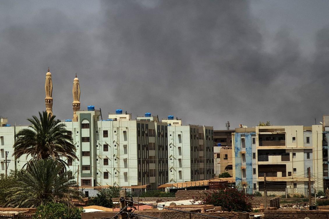 Smoke billows in Sudan's capital Khartoum on May 27, 2023, five days into a one-week ceasefire. (AFP)