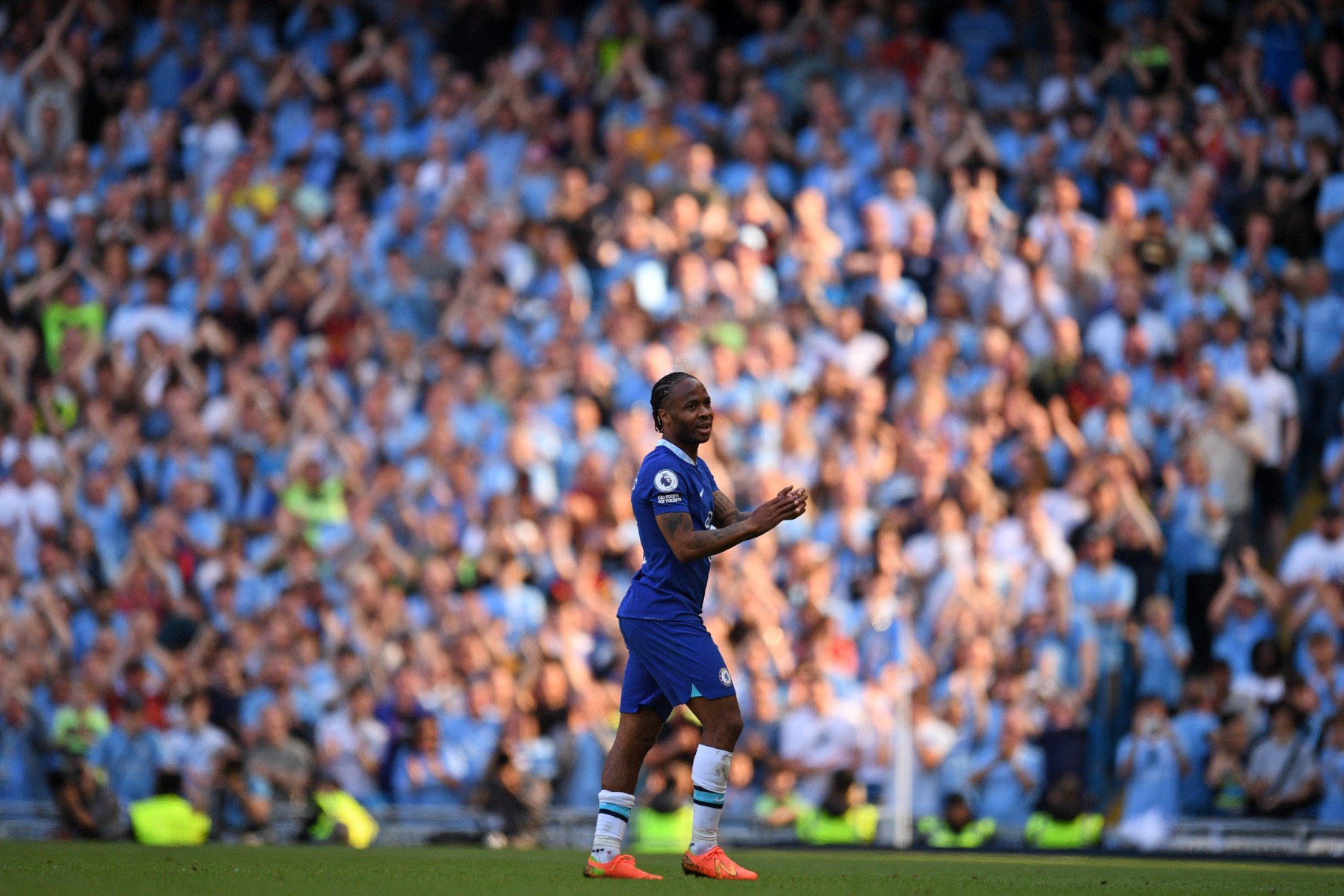 Chelsea's English midfielder Raheem Sterling leaves the pitch after being substituted off during the English Premier League football match between Manchester City and Chelsea at the Etihad Stadium in Manchester, north west England, on May 21, 2023. (AFP)
