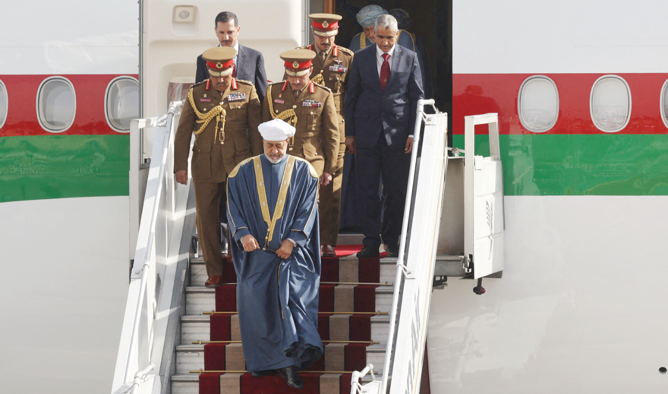 Oman’s Sultan Haitham bin Tariq arrives at Mehrabad Airport in Tehran on Sunday. (Reuters)