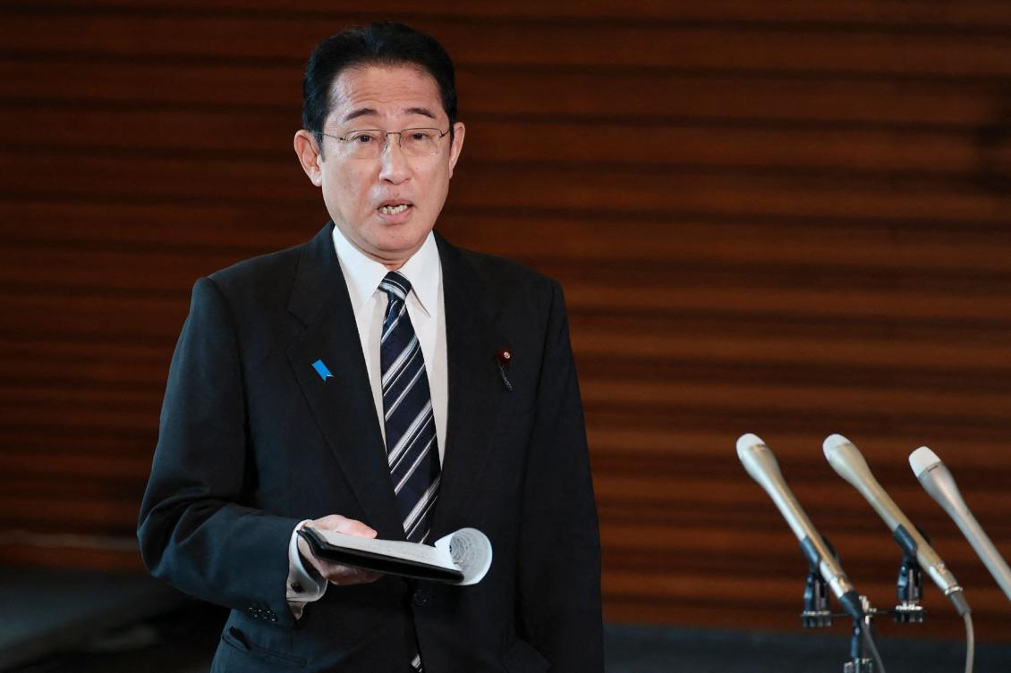Japan's Prime Minister Fumio Kishida answers questions from reporters after North Korea announced it would launch a satellite, at the prime minister's office in Tokyo. (AFP)