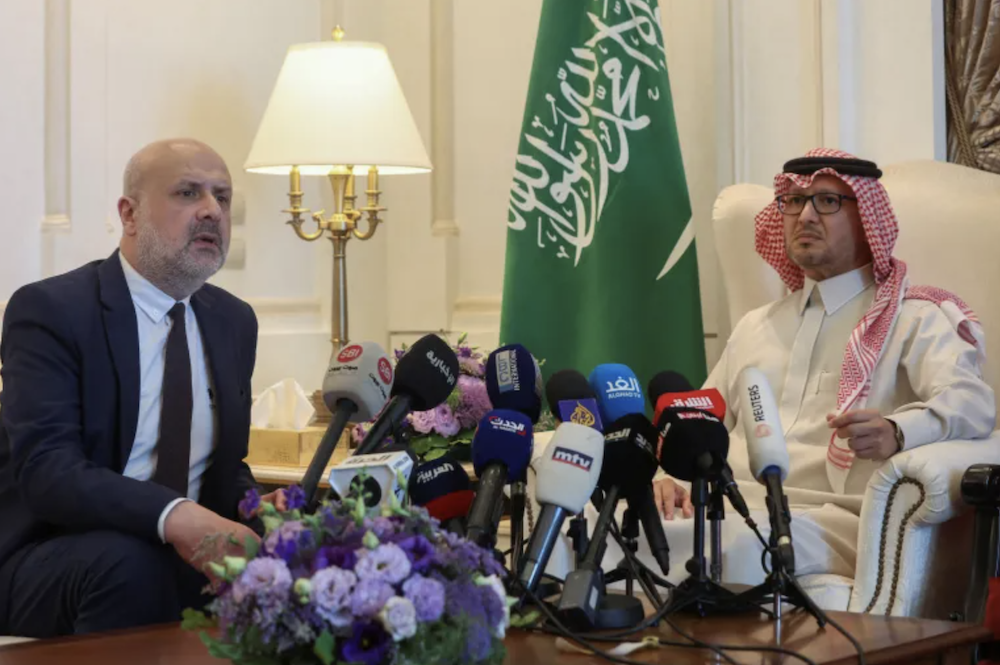 Saudi Ambassador to Lebanon Walid bin Abdullah Bukhari and Lebanon's caretaker Interior Minister Bassam Mawlawi attend a news conference at Saudi Arabia's embassy in Beirut, Lebanon. (Reuters)
