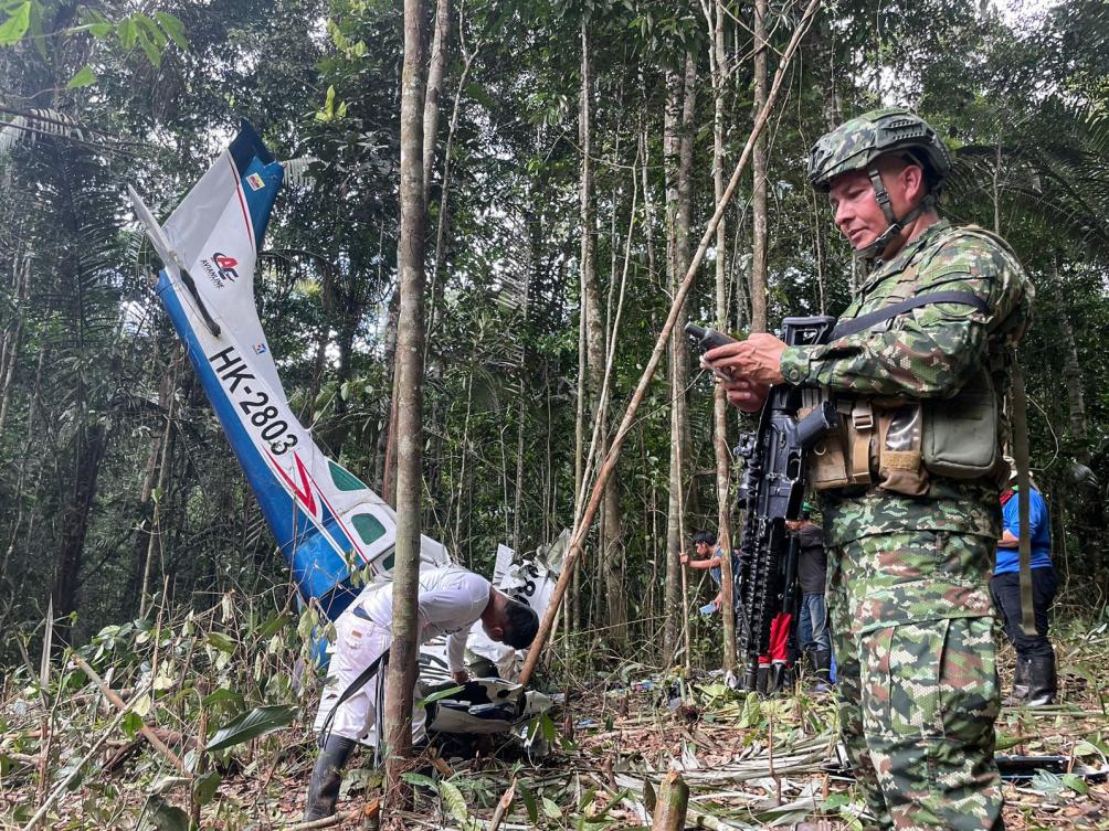 A soldier at the site of the plane crash in the Amazon forest, municipality of Solano, department of Caqueta, Colombia, May 23, 2023. (AFP)