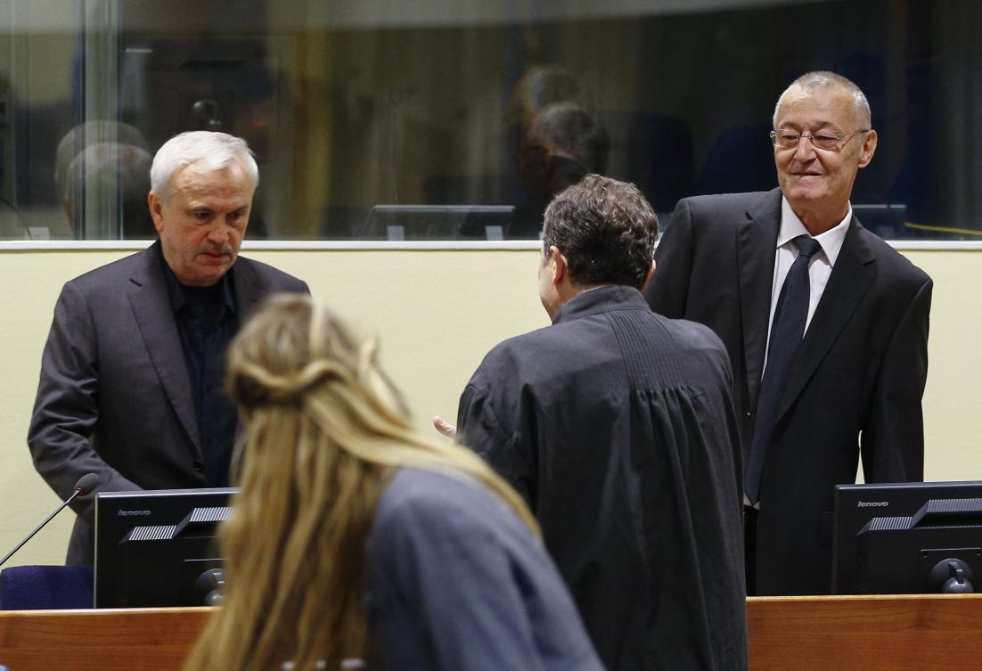 Former Serbian intelligence chiefs, Jovica Stanisic (L) and Franko Simatovic (R) appear in court as they go back on trial before a UN court in The Hague on June 13, 2017. (AFP)
