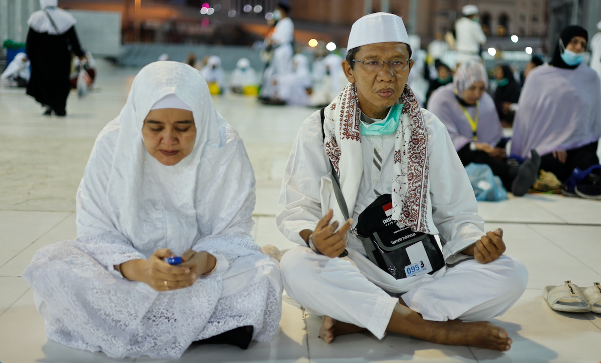 Above, Indonesian Hajj pilgrims sit in the Grand Mosque complex in Makkah Saudi Arabia on July 2, 2022. (Reuters file photo)