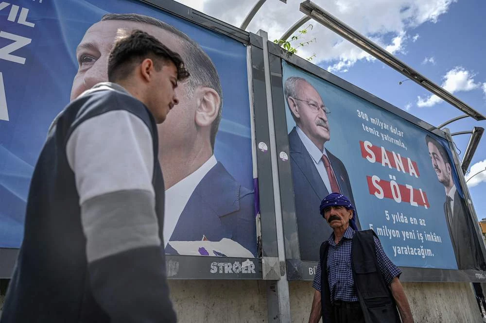 Above campaign billboards in the southwest of the city center of Sanliurfa on April 28, 2023. Turkiye has officially hosted 3.7 million Syrians, probably more than 5 million in total. ( AFP)