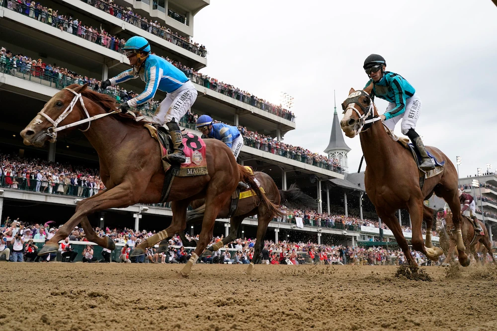 Javier Castellano celebrates after riding Mage to victory at the 149th running of the Kentucky Derby horse race at Churchill Downs Saturday in Louisville, Ky. (AP)