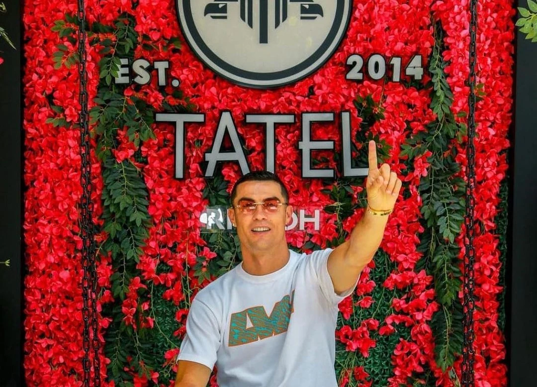 Portuguese football star Cristiano Ronaldo was all smiles as he promoted Spanish restaurant Tatel, backed by himself and tennis star Rafael Nadal, which opened its doors in Riyadh earlier this year. (Instagram)