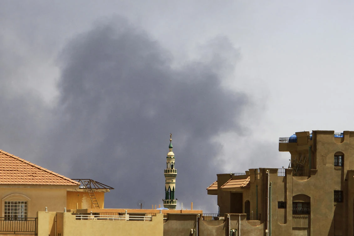 Above, smoke billows in southern Khartoum amid ongoing fighting between the forces of two rival generals in Sudan on May 10, 2023. (AFP)