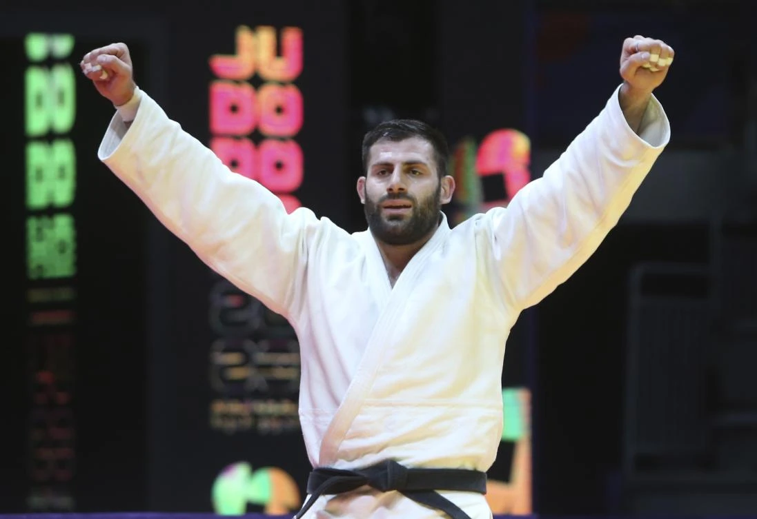 Arman Adamian Individual athlete, celebrates after he beats Lukas Krpalek of Czech Republic during their men’s -100kg gold judo match at the World Judo Championships in Doha on May 12, 2023. (AP)