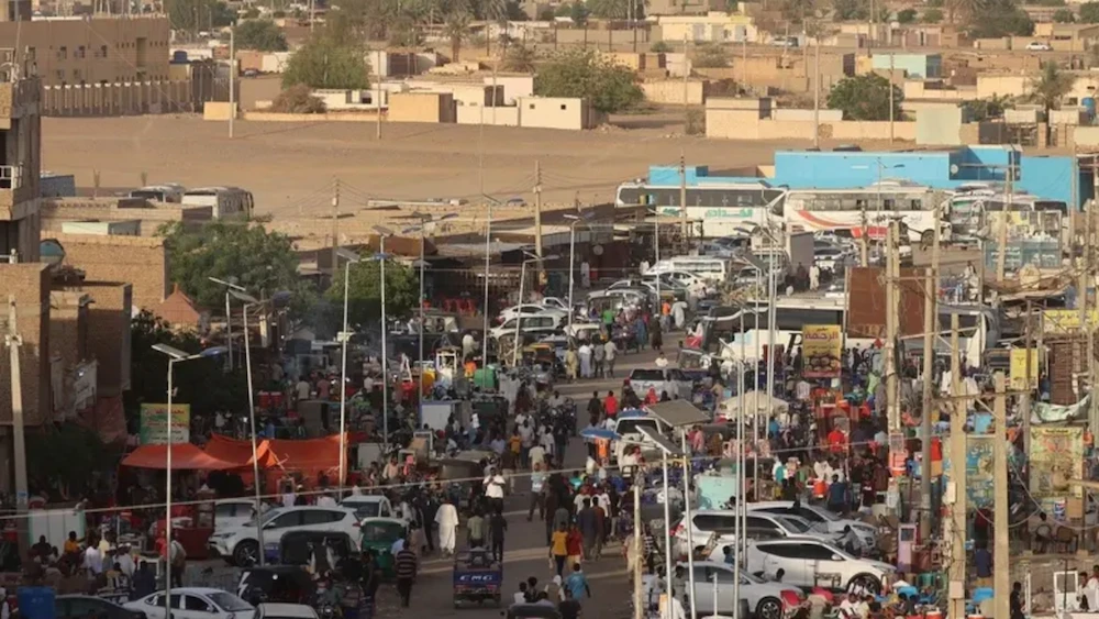 People gather in the Sudanese town of Wadi Halfa bordering Egypt on May 4, 2023. (AFP)