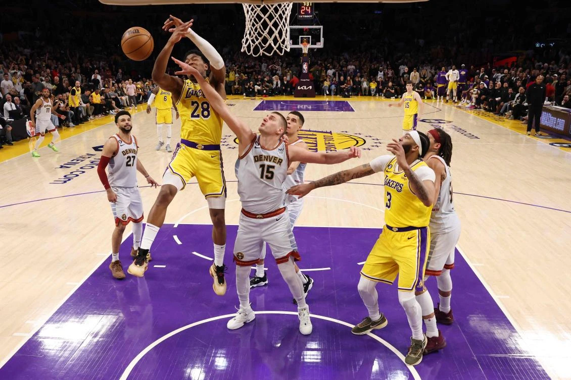 Nikola Jokic #15 of the Denver Nuggets blocks the shot attempt of Rui Hachimura #28 of the Los Angeles Lakers during the third quarter in game four of the Western Conference Finals. (AFP)