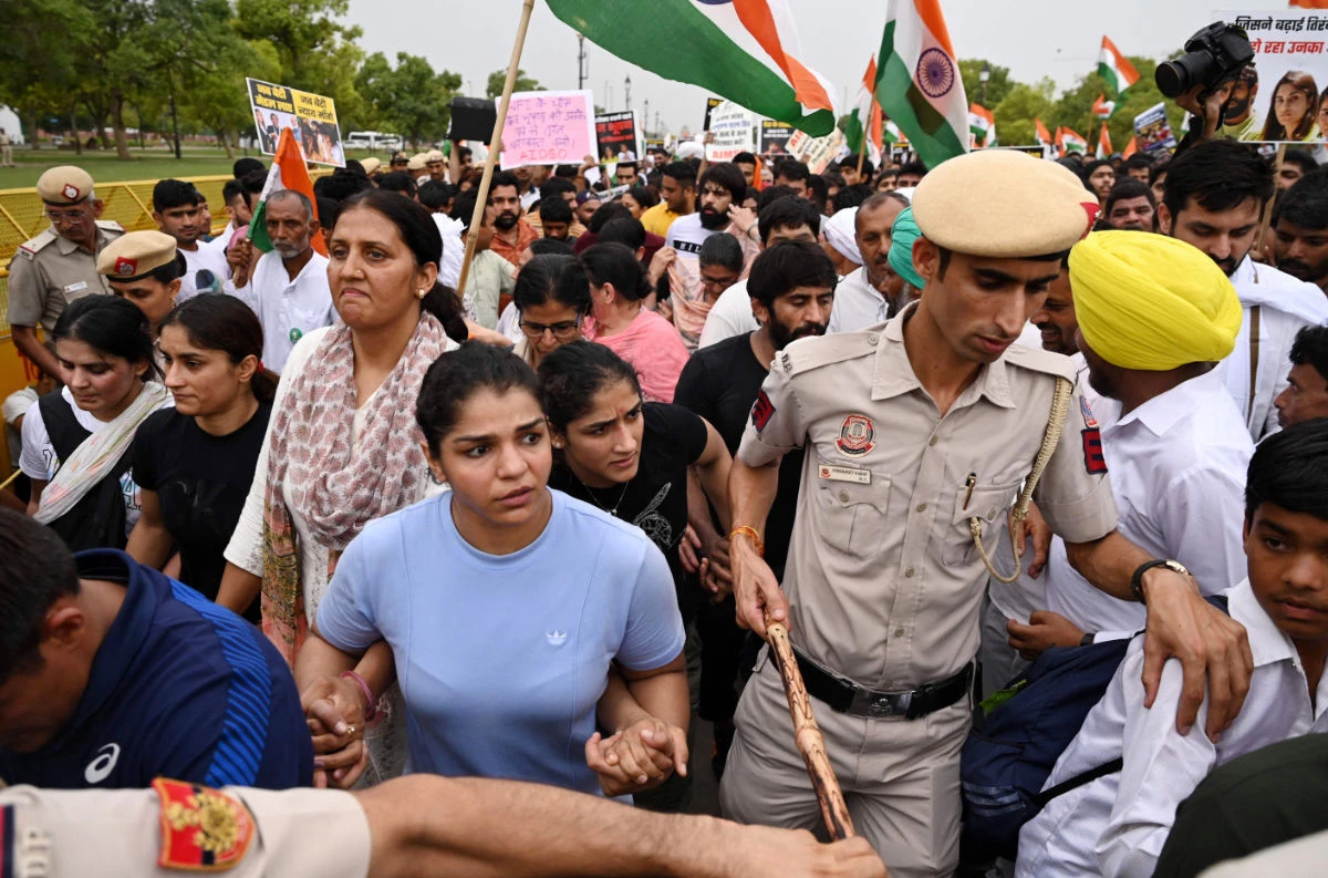 Indian wrestlers take part in a protest march against the sport's local federation chief over allegations of sexual harassment and intimidation, in New Delhi on May 23, 2023. (AFP)