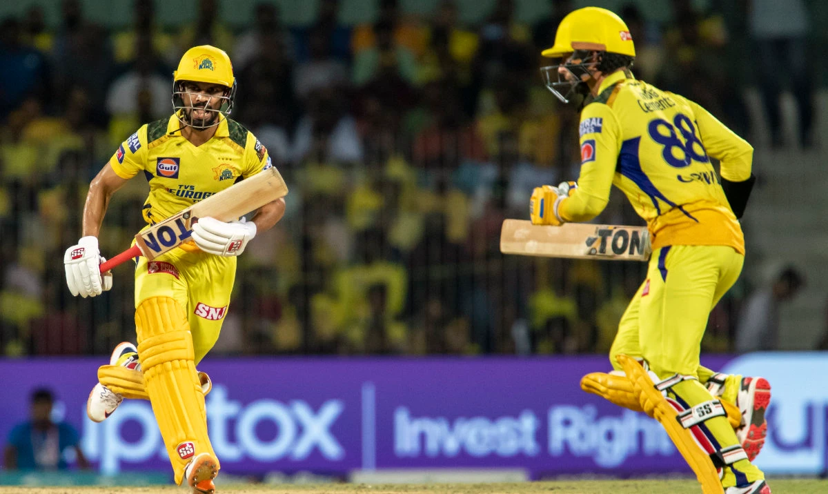 Chennai Super Kings' Ruturaj Gaikwad, left, and Devon Conway run between the wickets during the Indian Premier League playoff cricket match between Chennai Super Kings and Gujrat Titans in Chennai, India, Tuesday. (AP)