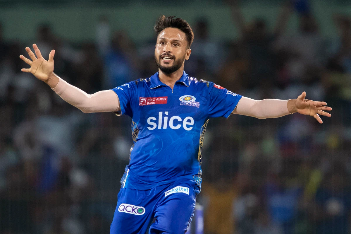 Mumbai Indians' Akash Madhwal celebrates the wicket of Lucknow Super Giants' Krishnappa Gowtham during the Indian Premier League cricket eliminator match between Mumbai Indians and Lucknow Super Giants in Chennai on Wednesday. (AP)