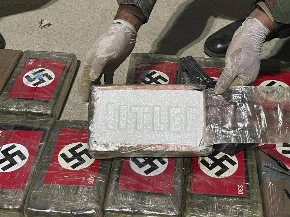 Peruvian authorities have previously reported finding cocaine in brick-shaped packages, but never with one of the flag of Nazi Germany. (Peruvian Anti-Drug Police)