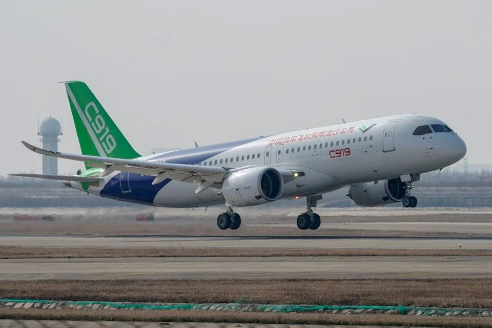 The C919 plane, built by the Commercial Aviation Corporation of China, carried about 130 passengers on the flight. (Reuters)
