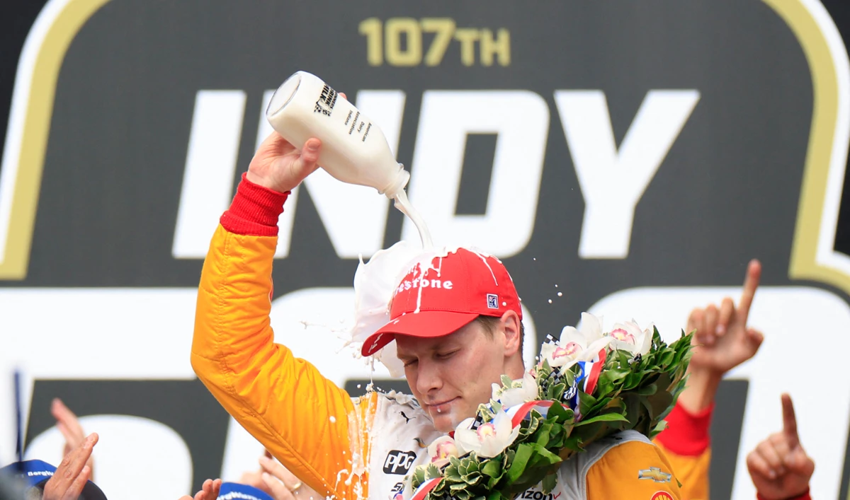 Josef Newgarden, driver of the #2 PPG Team Penske Chevrolet, celebrates after winning the 107th Running of the Indianapolis 500 at Indianapolis Motor Speedway on Sunday in Indianapolis, Indiana. (AFP)