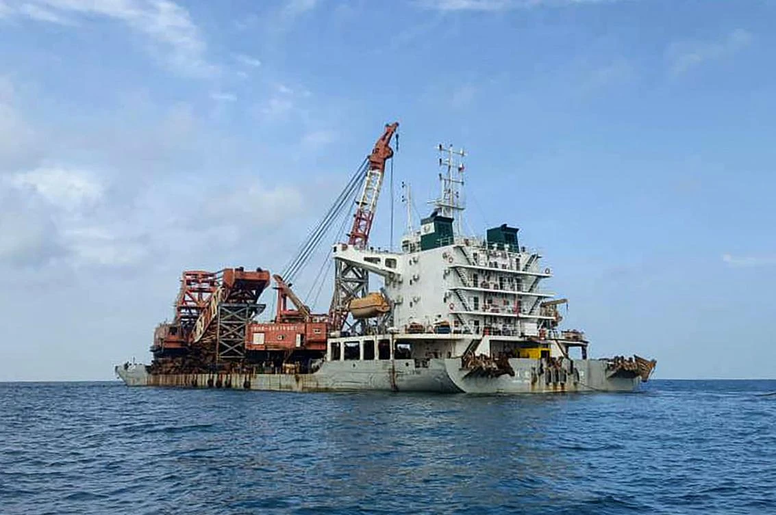 Above, the Chinese vessel anchored near Tanjung Siang on the waters of the Malaysia’s Johor state after its crew was detained on suspicion of looting two British World War II shipwrecks. (Malaysian Maritime Enforcement Agency/AFP)