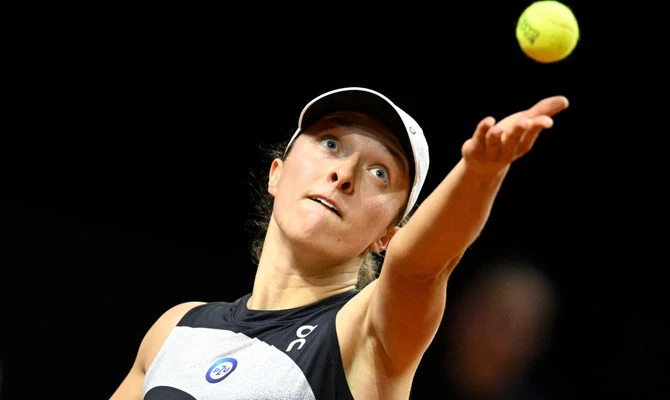 Reigning French Open champion Iga Swiatek says the Ukraine war has caused "chaos" in the world of sport. (AFP/File)