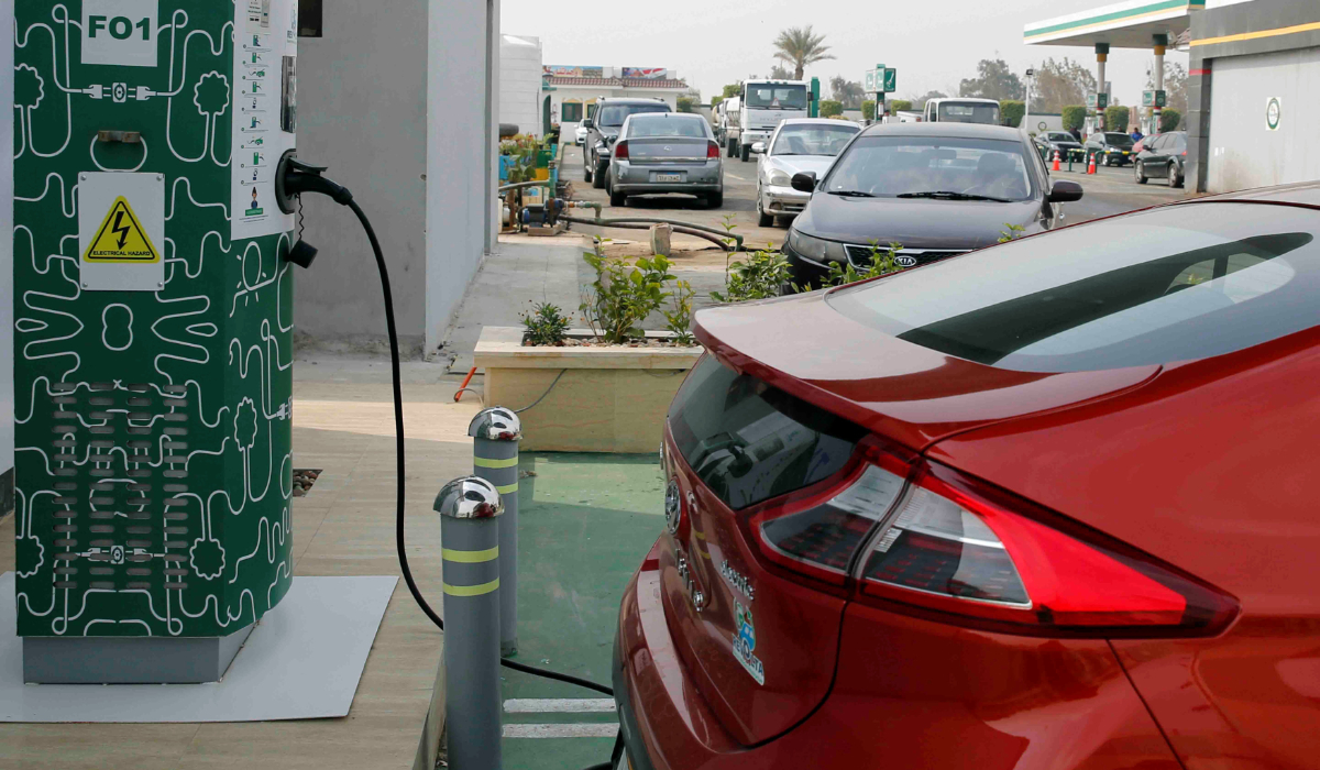 An electric car charging box is seen with Hyundai's Ioniq, at Revolta charging station in Cairo, Feb. 19, 2018. (REUTERS)
