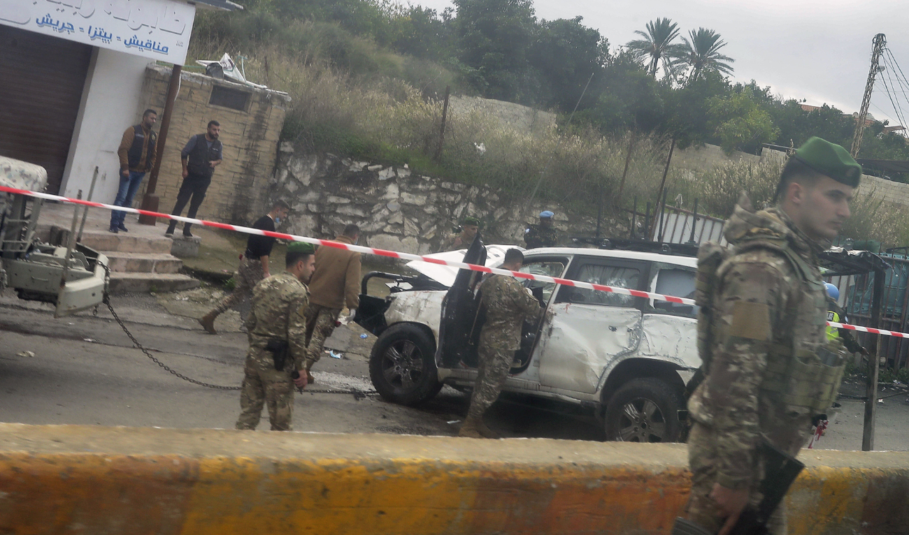 Lebanese forces secure the area where a UN peacekeeping force UNIFIL convoy came under small arms fire, in the village of Al-Aqabiya in south Lebanon, on December 15, 2022. (AFP)