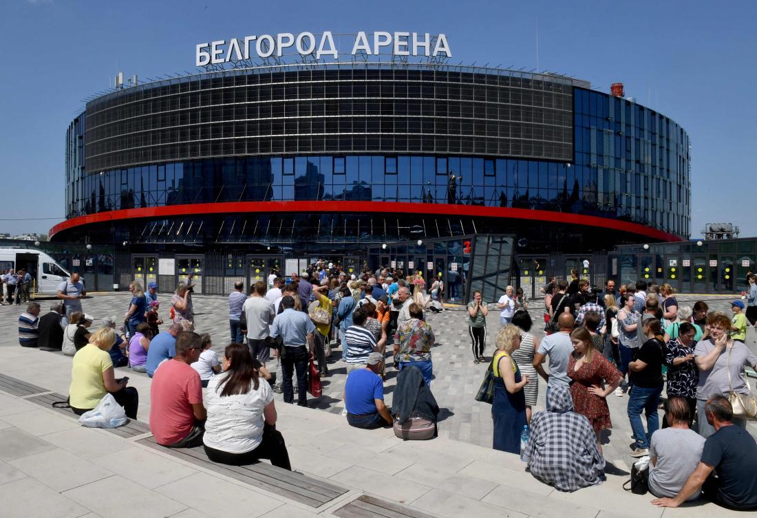 Residents, including those evacuated from the town of Shebekino, queue outside a temporary shelter set up at the Belgorod Arena in the regional capital of Belgorod on Jun. 2, 2023. (AFP)