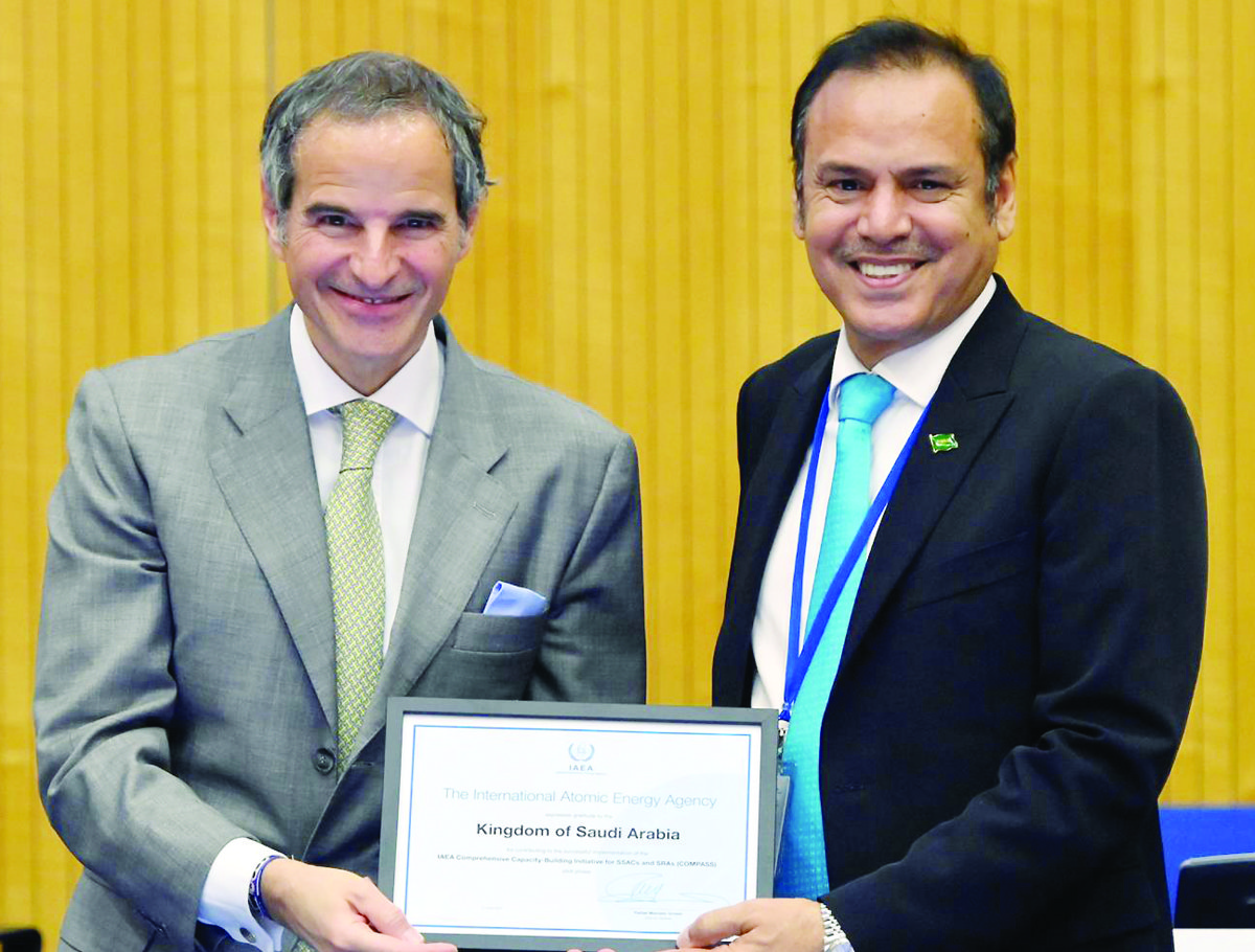 Saudi Arabia’s Jalawi bin Nasser Al-Qahtani receives IAEA’s certificate from Rafael Grossi in Vienna. (Supplied)
