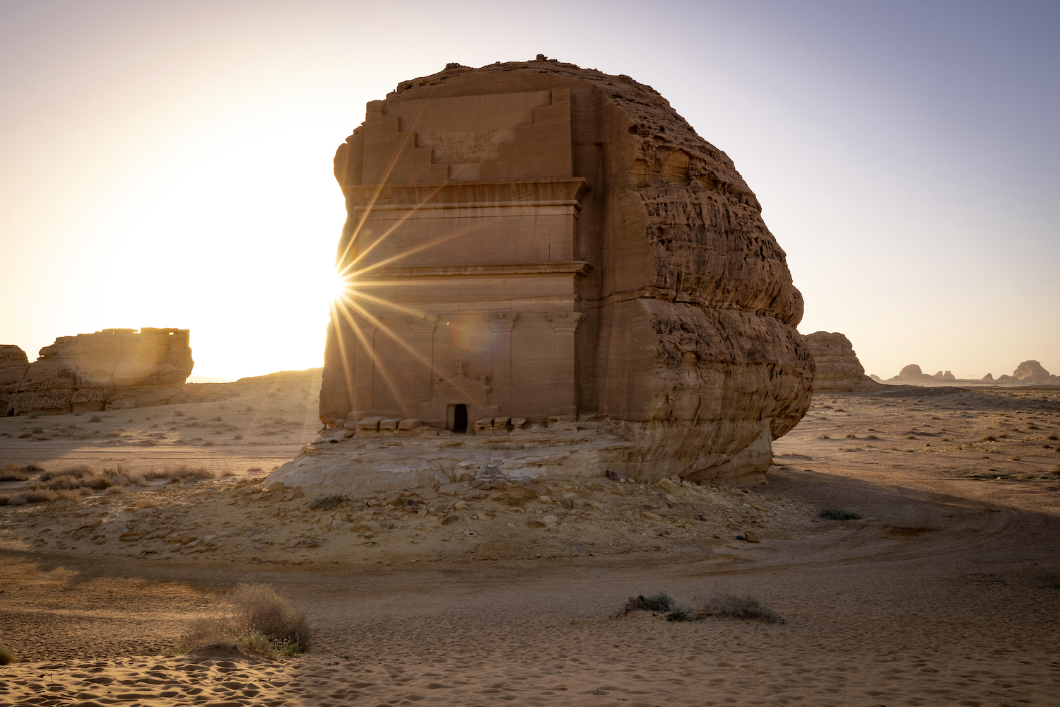 A photograph shows an ancient Nabataean carved tomb at the archaeological site of Hegra, near the northwestern Saudi city of AlUla. (File/AFP)