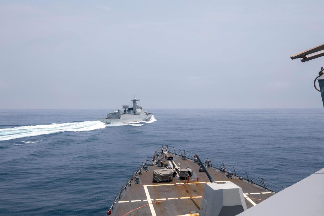 US Navy shows the Arleigh Burke-class guided-missile destroyer USS Chung-Hoon observing the Chinese PLA Navy vessel Luyang III (top) while on a transit through the Taiwan Strait. (AFP)