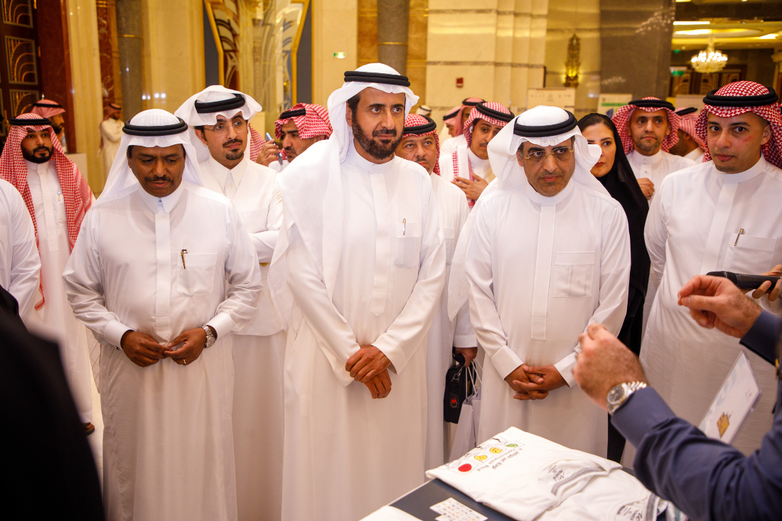 Hajj and Umrah Minister Dr. Tawfiq Al-Rabiah (C), his deputy Abdulfattah bin Sulaiman Mashat (left), and Saeed Al-Ghamdi, managing director and GCEO of SNB (R) review the Ambassadors of Creativity Program. (Supplied)