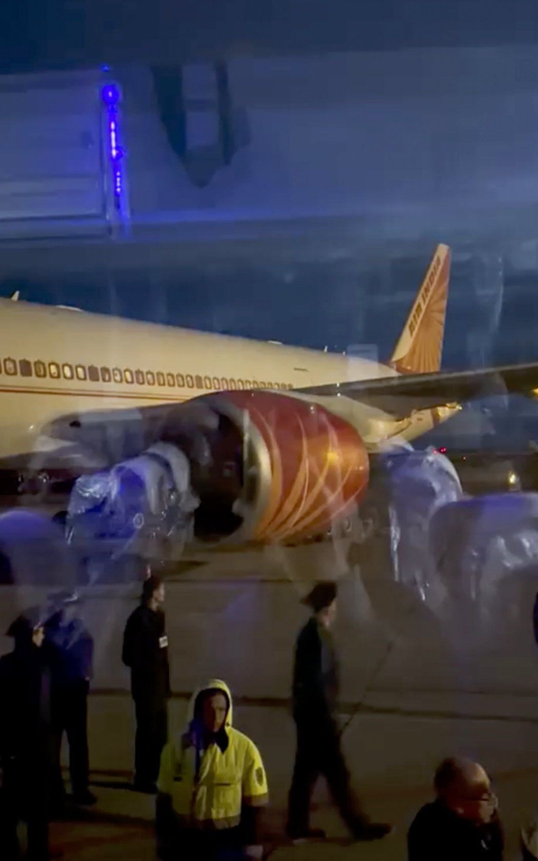 This image from video provided by passenger Girvaan Singh Kahma shows Air India's Boeing 777 after it landed at Russia's Magadan airport in Siberia on Tuesday, June 6, 2023. (AP)
