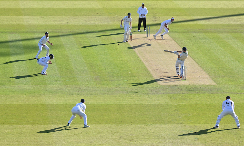 With the field up, Ireland's Lorcan Tucker hits a boundary off the bowling of England's Stuart Broad during play on day 2 of the Test match between England and Ireland at the Lord's cricket ground in London, on June 2, 2023 (AFP)
