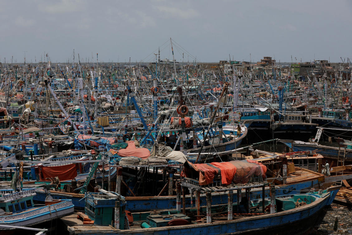View of anchored fishing boats, after ban imposed on coastal activities following the cyclonic storm, Biparjoy, over the Arabian Sea, at Karachi’s Fish Harbor on Jun. 10, 2023. (Reuters)