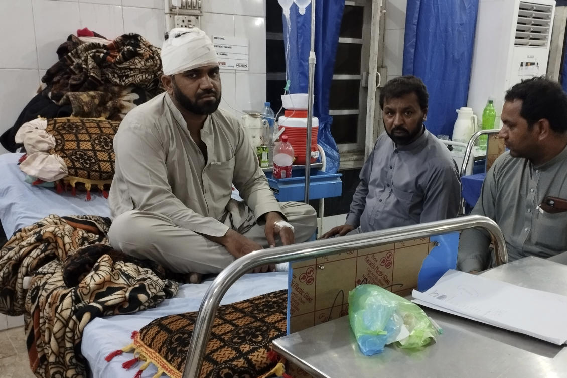 An injured victim of rain storm is treated at a hospital in Bannu, a town of Pakistan's Khyber Pakhtunkhwa province, Saturday, June 10, 2023. (AP)