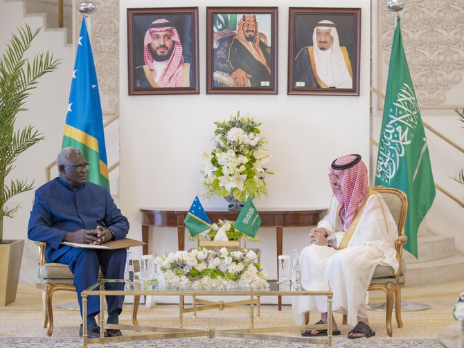 Saudi Foreign Minister Prince Faisal bin Farhan receives Prime Minister of the Solomon Islands Manasseh Sogavare. (Twitter/@KSAMOFA)
