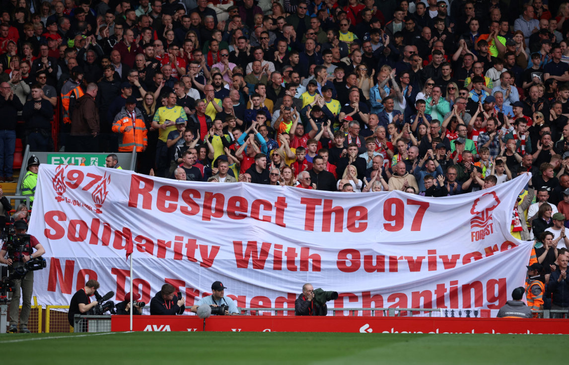 In this April 22, 2023 file photo Nottingham Forest fans hold up a banner in memory of the 97 victims of the Hillsborough disaster during the Premier League game between Liverpool and Nottingham Forest at Anfield. (File/Reuters)