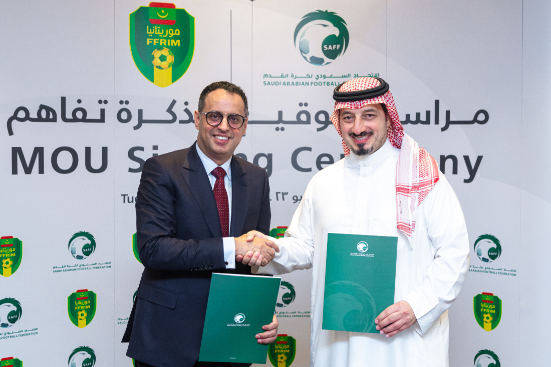President of the SAFF Yasser Al-Misehal with Ahmed Yahya, president of the Mauritania Football Federation. (Supplied)