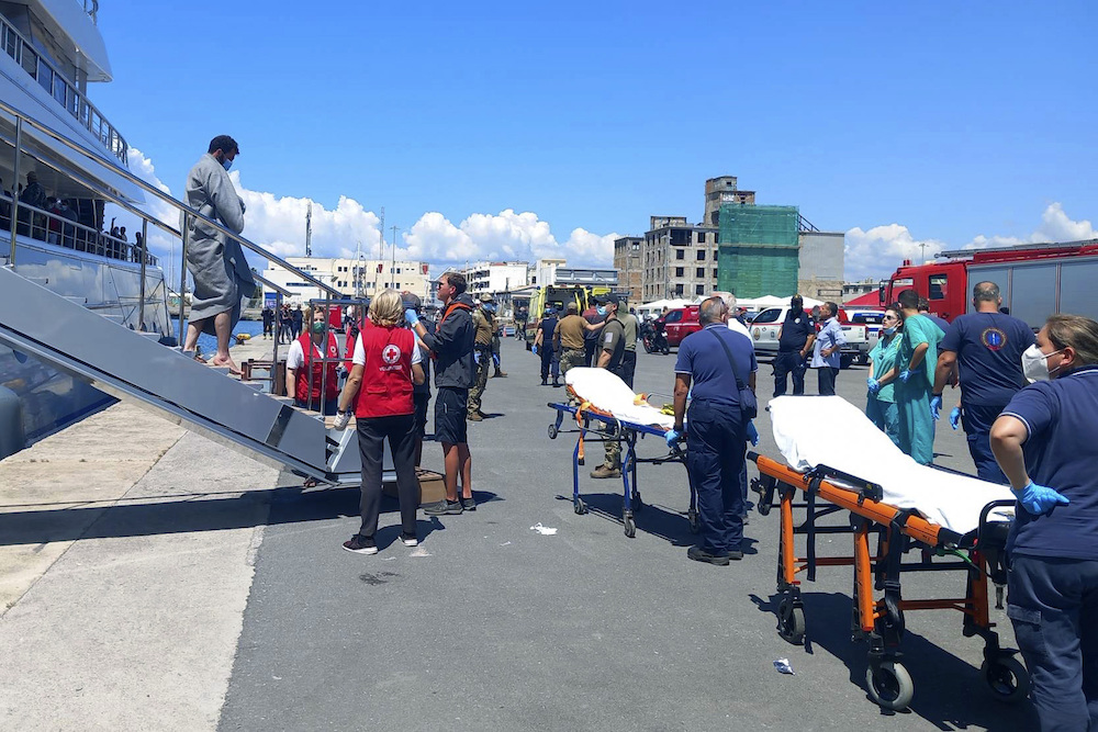Survivors arrive by yacht after a rescue operation at the port in Kalamata town, about 240 kilometers southwest of Athens on Wednesday, June 14, 2023. (www.argolikeseidhseis.gr via AP)