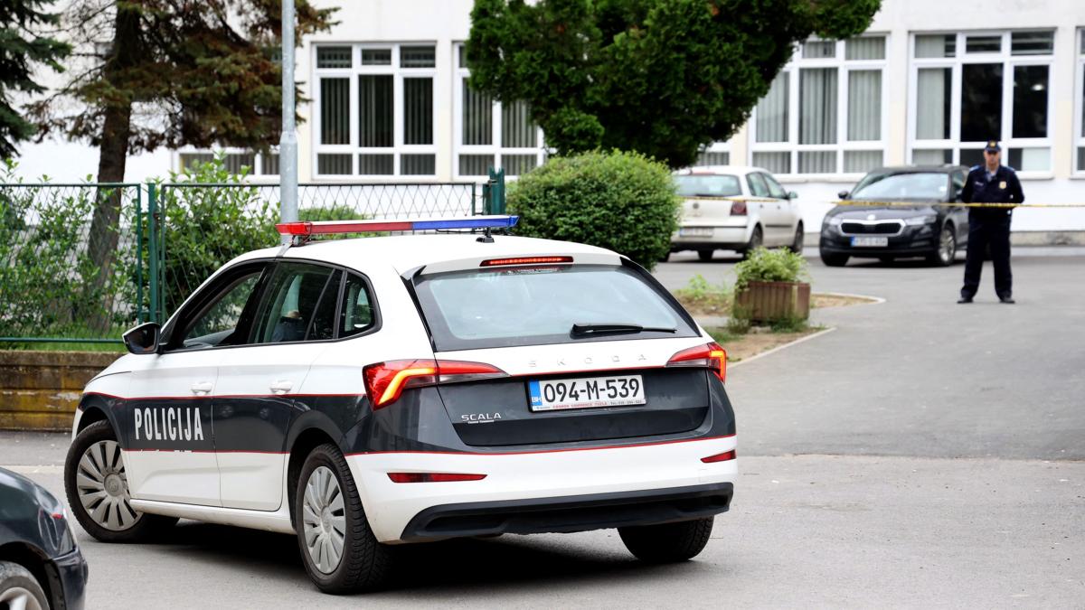 Bosnian police secure the area after a shooting at an elementary school in the northeastern Bosnian city of Lukavac on June 14, 2023. (AFP)